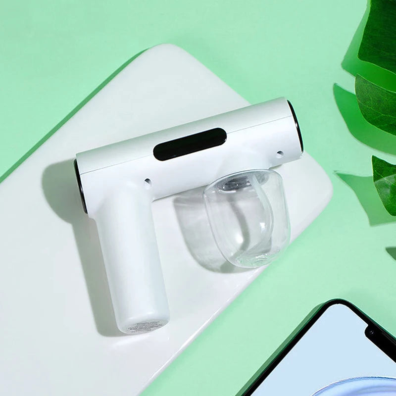 Portable Handheld Electric Humidification Spray Gun Household Travel Supplies Atomised Blue Light Rechargeable Disinfection Gun