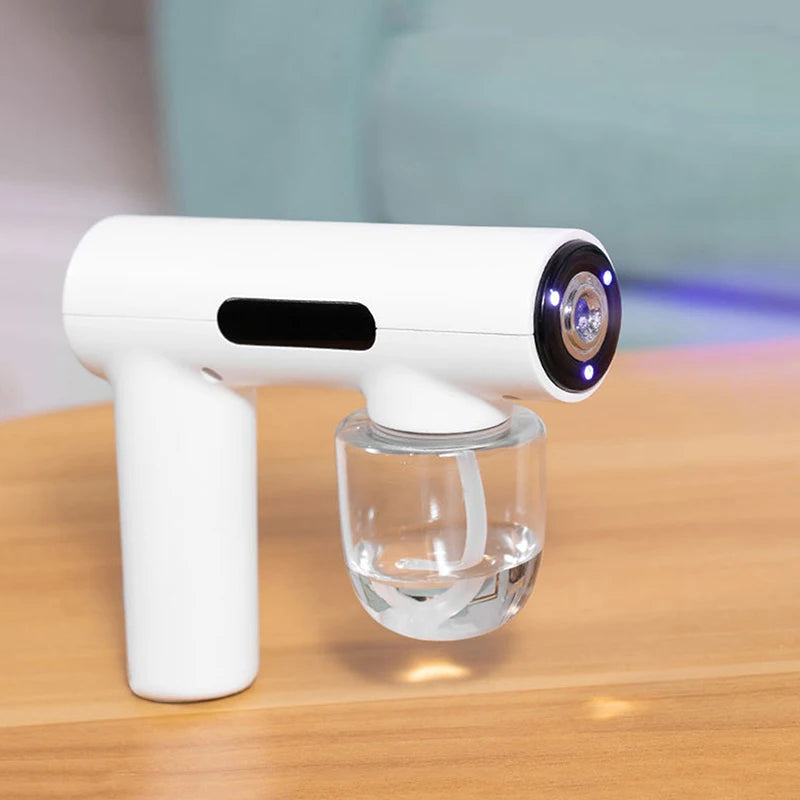 Portable Handheld Electric Humidification Spray Gun Household Travel Supplies Atomised Blue Light Rechargeable Disinfection Gun