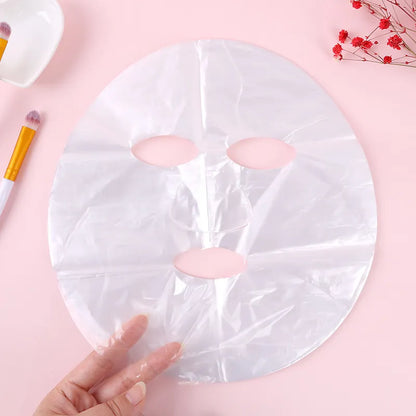 100pcs Plastic Film Facial Mask Skin Care Uncompressed Ultra Thin Beauty Salon Promote Products Absorption Diy Disposable Mask